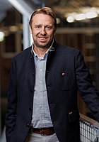 Dieses Bild zeigt das Portrait einer Person.