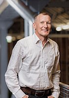 Dieses Bild zeigt das Portrait einer Person.