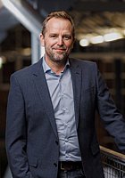 Dieses Bild zeigt das Portrait einer Person.