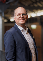 Dieses Bild zeigt das Portrait einer Person.