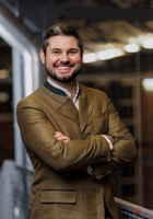 Dieses Bild zeigt das Portrait einer Person.