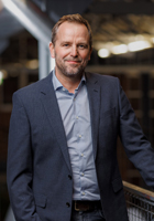 Dieses Bild zeigt das Portrait einer Person.